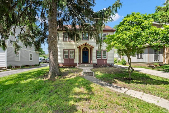 view of front of home featuring a front yard