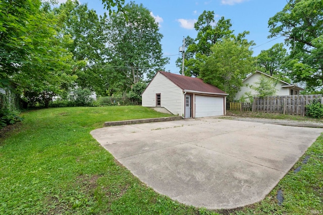 garage with a yard