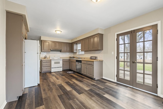 kitchen with white appliances, tasteful backsplash, french doors, and dark hardwood / wood-style floors