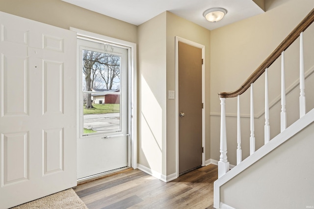 entrance foyer featuring hardwood / wood-style flooring