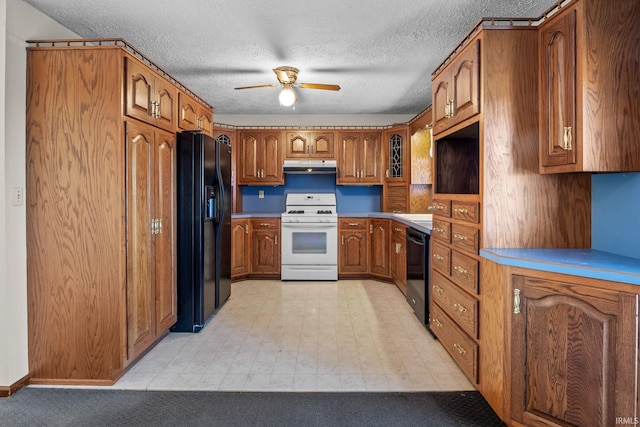 kitchen with a textured ceiling, ceiling fan, and black appliances