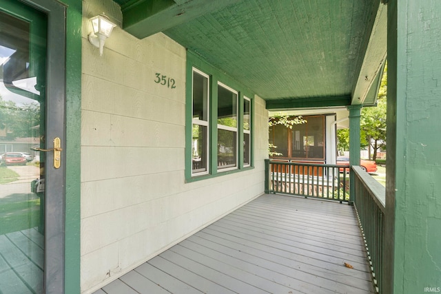 wooden deck featuring a porch