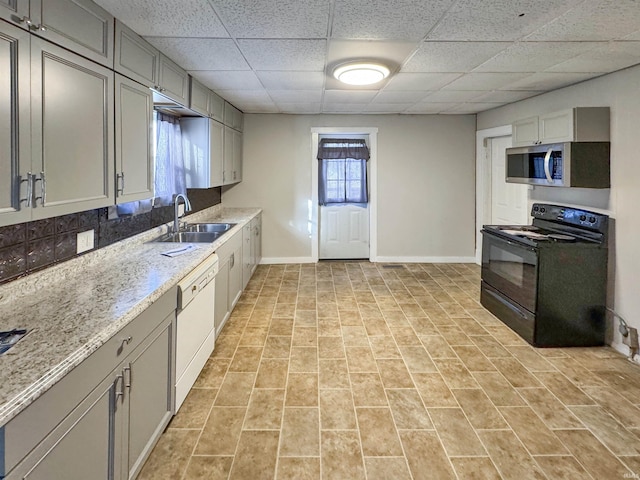 kitchen featuring sink, gray cabinets, dishwasher, and black electric range oven