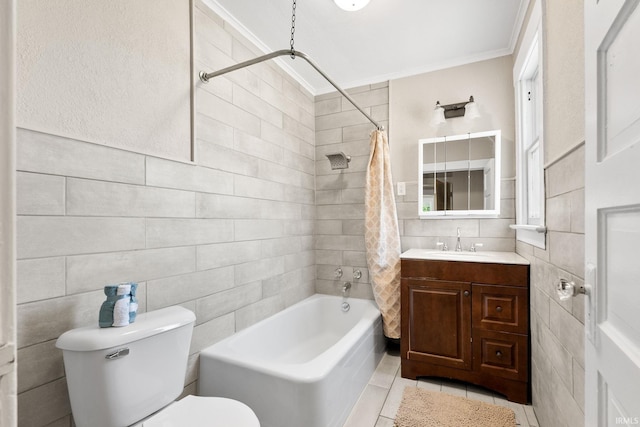 full bathroom featuring ornamental molding, toilet, tile patterned floors, shower / bath combo, and vanity