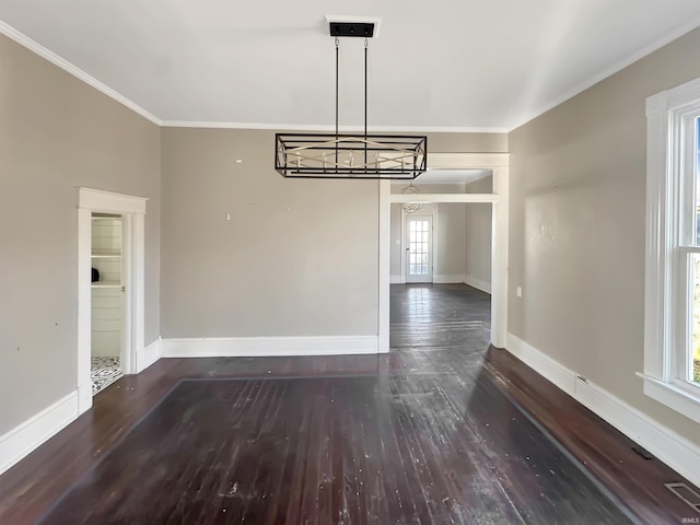 unfurnished dining area with crown molding and dark hardwood / wood-style flooring