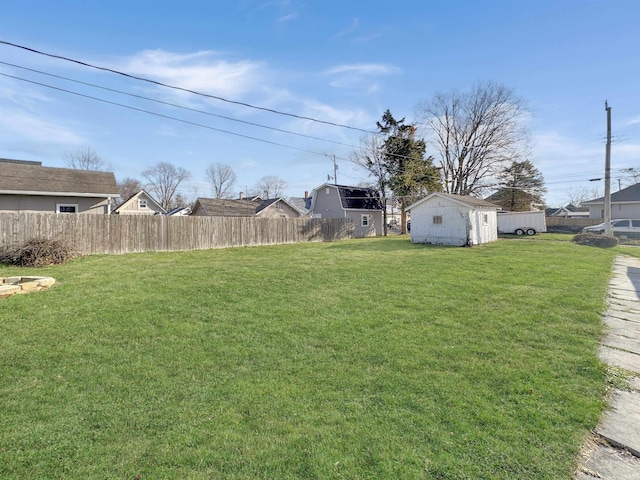 view of yard with a storage shed