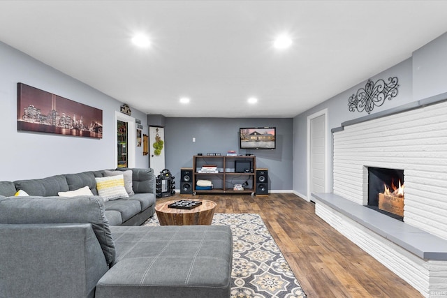 living room with dark hardwood / wood-style flooring