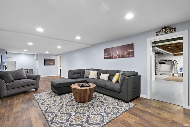 living room with dark hardwood / wood-style floors