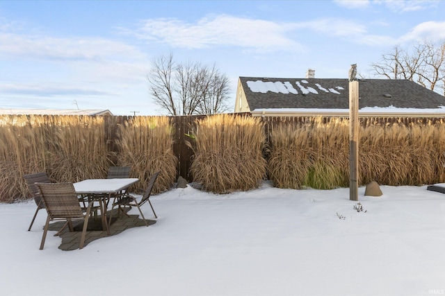 view of yard covered in snow