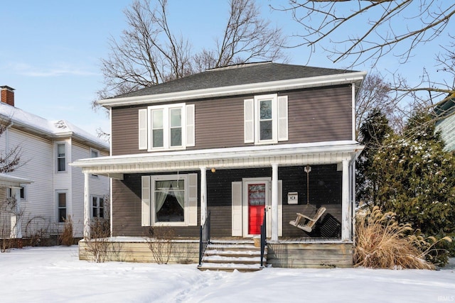 front of property featuring covered porch