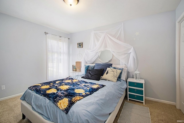 bedroom featuring carpet