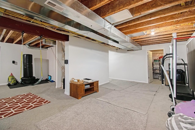 basement with light colored carpet