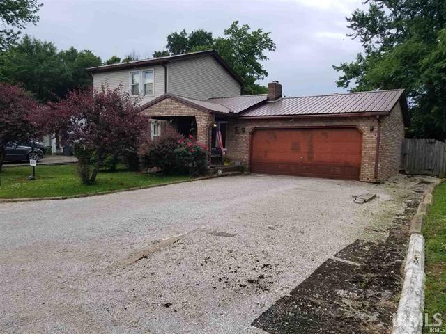 front facade with a garage