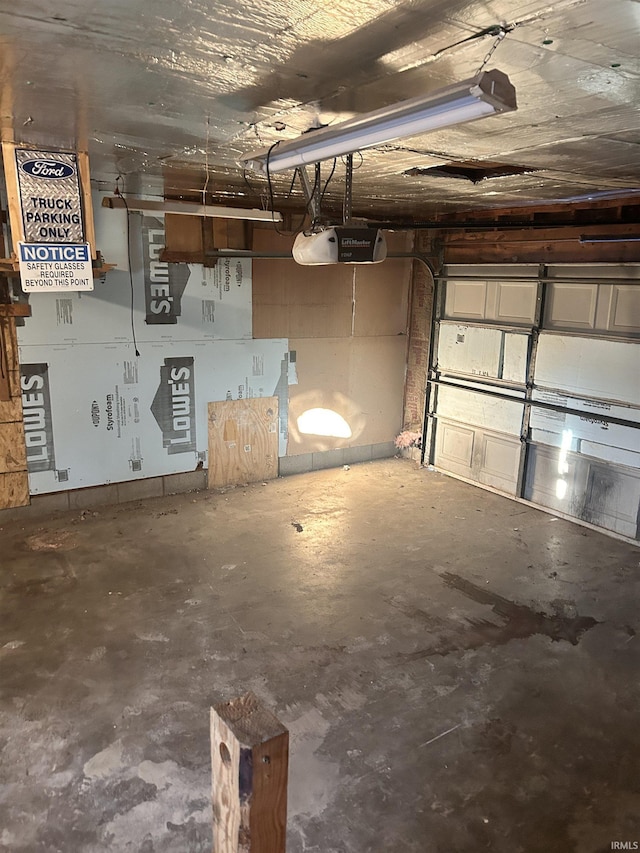 garage featuring a garage door opener