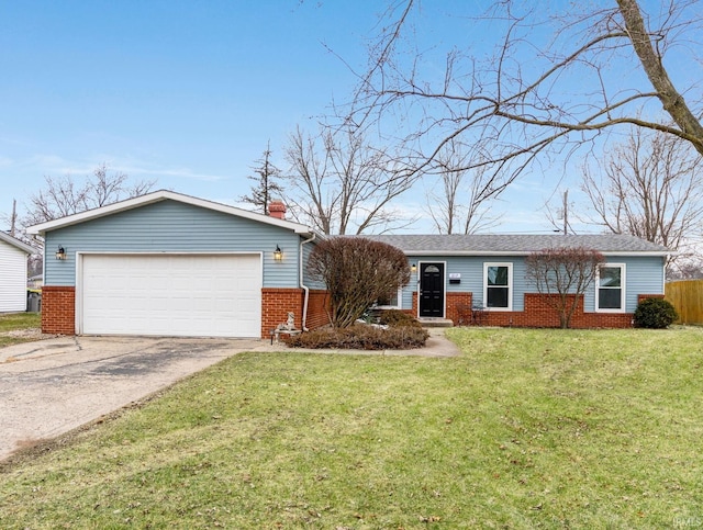 ranch-style house featuring a garage and a front lawn