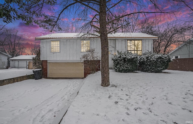 view of front of property with a garage