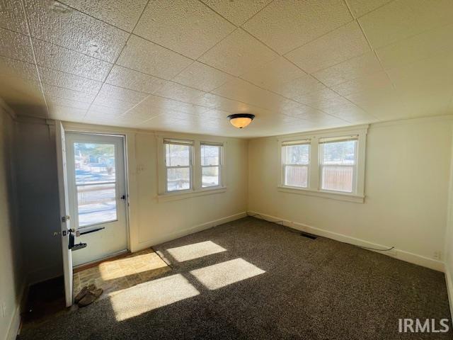 spare room featuring carpet flooring