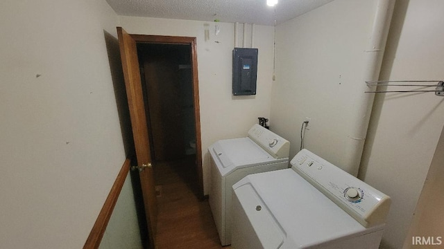 washroom with electric panel and washing machine and clothes dryer