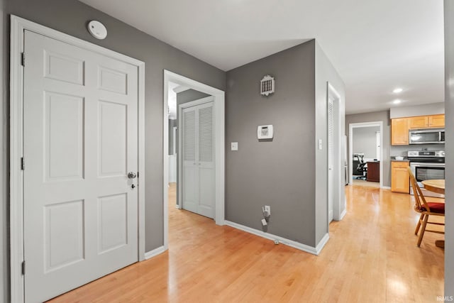 hall featuring light hardwood / wood-style floors