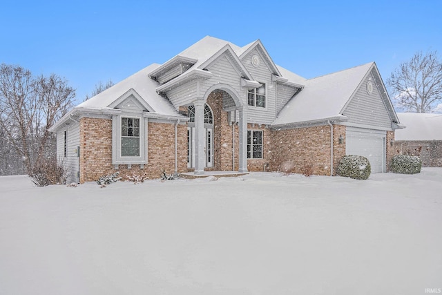 view of front of property featuring a garage