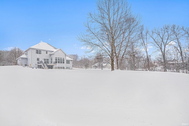 view of snowy yard