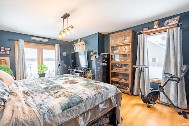 bedroom with light wood-type flooring