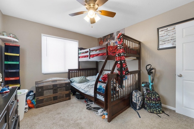 bedroom featuring ceiling fan and light colored carpet