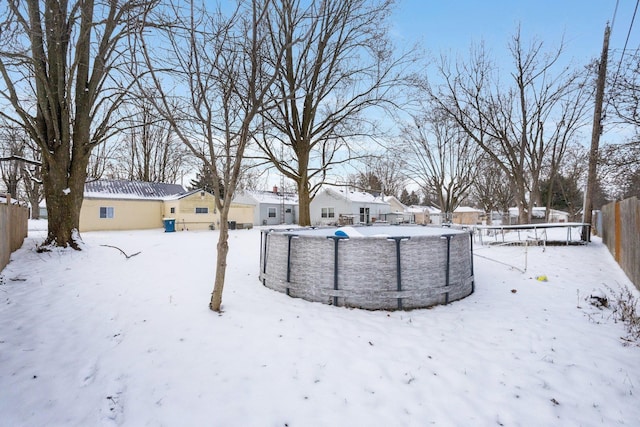 view of yard covered in snow