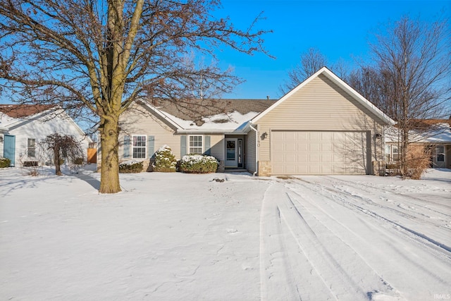 single story home featuring a garage