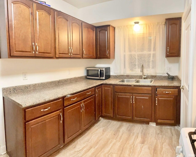 kitchen with stove and sink