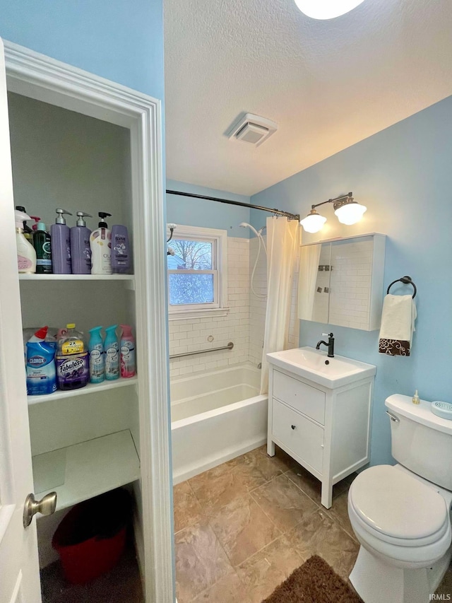 full bathroom with a textured ceiling, shower / tub combo with curtain, vanity, and toilet