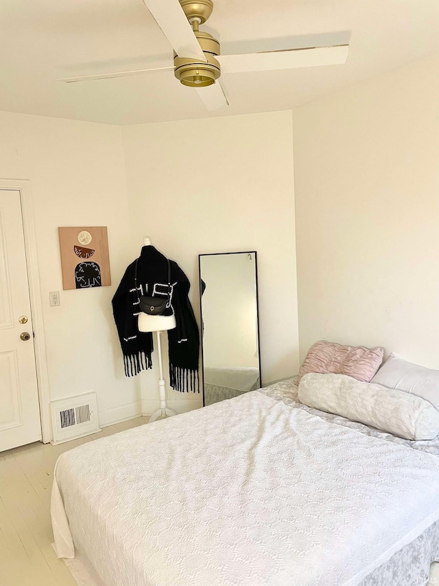 bedroom featuring ceiling fan and light wood-type flooring