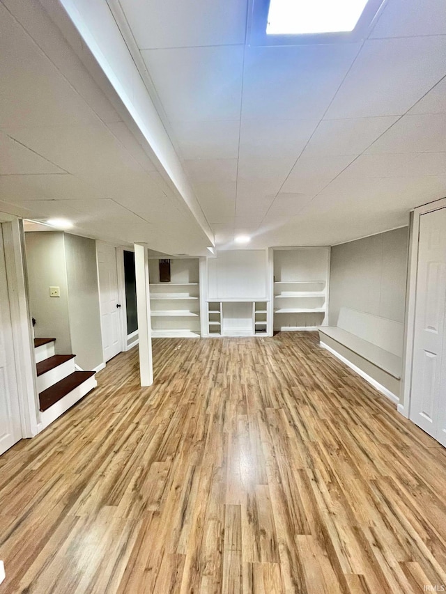 basement with light wood-type flooring