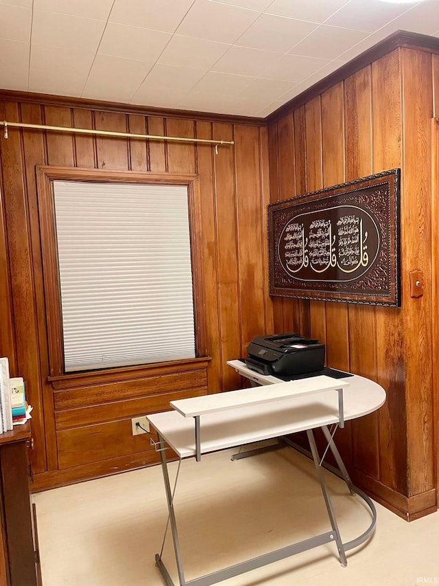 miscellaneous room featuring wooden walls