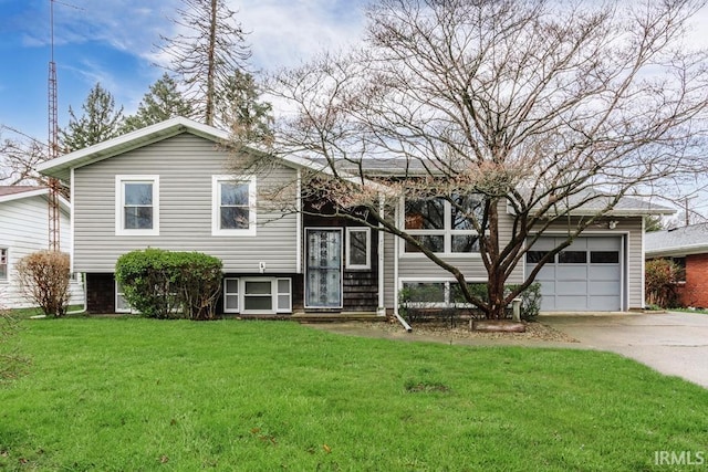 view of front of home with a front lawn and a garage