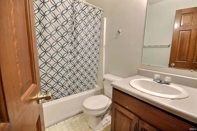 full bathroom featuring toilet, shower / tub combo, and vanity