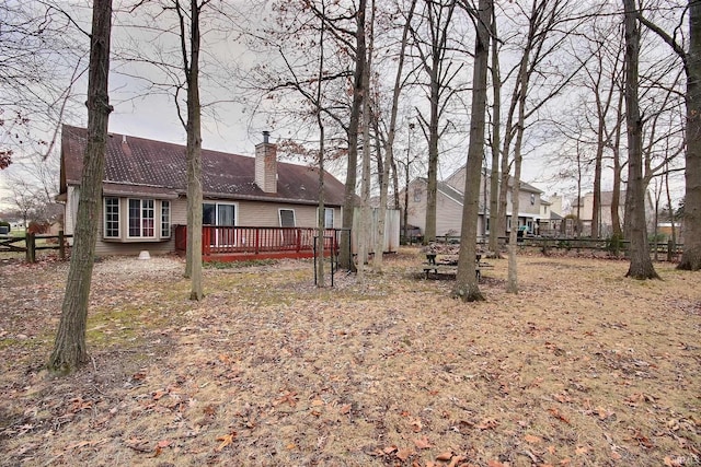 view of yard with a wooden deck