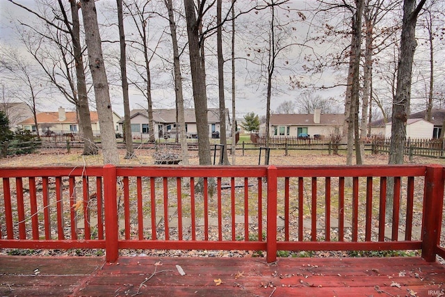 view of gate with a deck