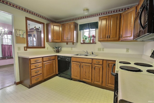 kitchen with black appliances and sink