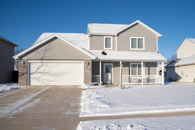 view of front of property featuring a garage and covered porch