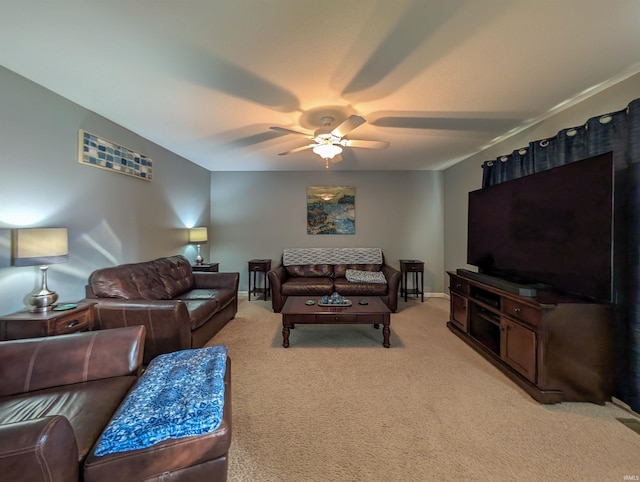 living room with ceiling fan and light colored carpet