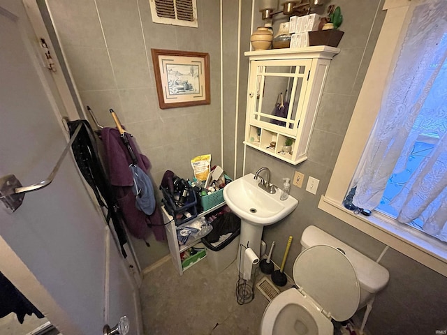 bathroom with toilet and sink