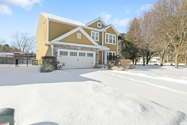 craftsman house with a garage