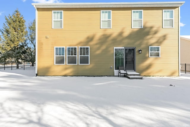 view of snow covered property