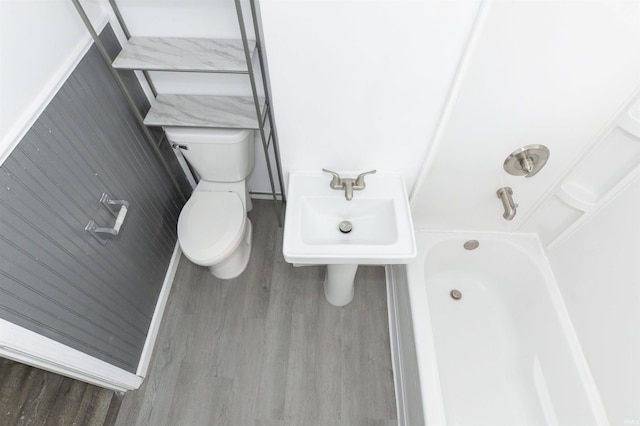 full bathroom with sink, shower / bathing tub combination, and toilet