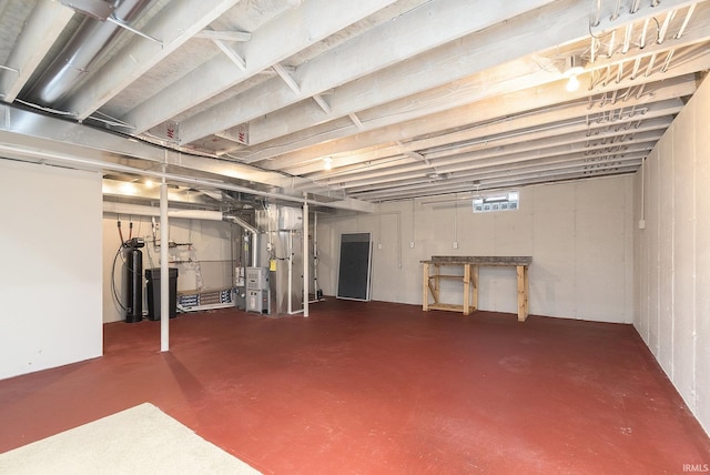 basement featuring heating unit