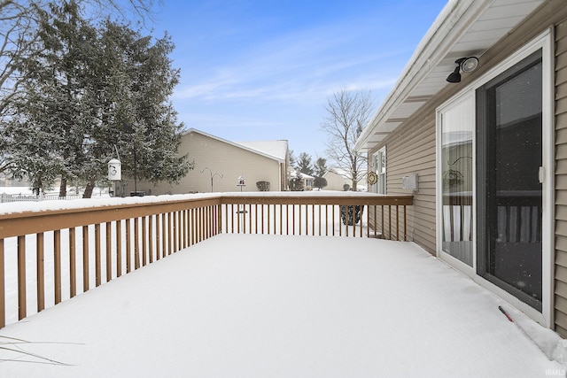 view of snow covered deck