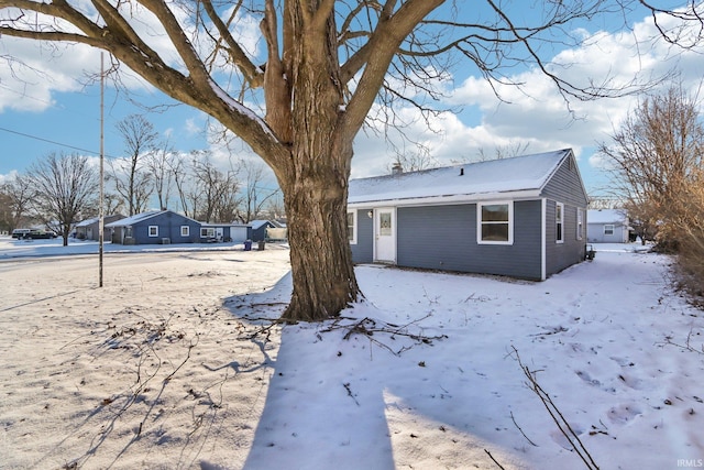 view of snow covered property