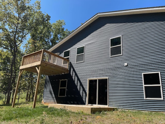 rear view of property with a deck