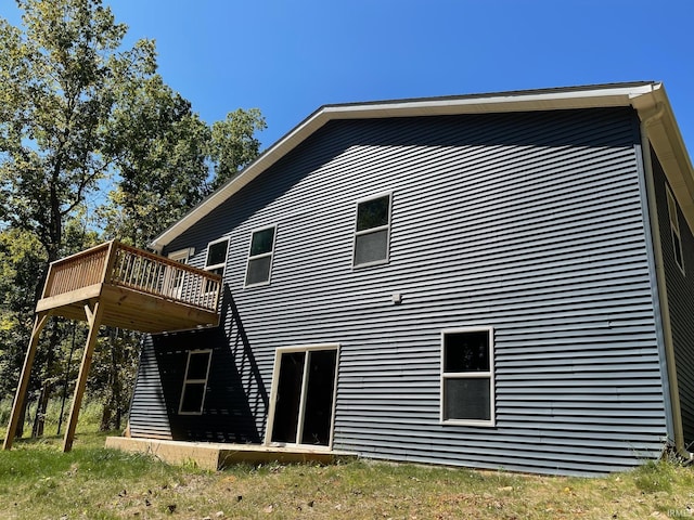 view of side of property with a deck